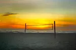 The volleyball court size changes with varying disciplines of the sport. This basic volleyball info describes the official size and height for each discipline. 