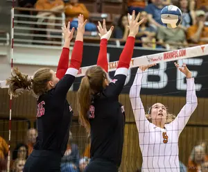 A double block is one of the basic volleyball terms for blocking that describes when 2 players jump to cover cross court or the line to stop an attack hit. 
