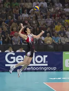 Use the overhand jump float serve to generate a powerful serve that starts a rally after the ref blows the whistle for the player behind the service line.  