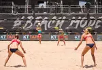 Your beach volleyball ready position is important because the primary function of your arms when you pass is to redirect the volleyball to your intended target.