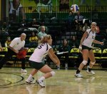 female player passing a volleyball