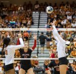 Texas longhorns setter set to the middle Texas Tech blockers watching the setter ralph