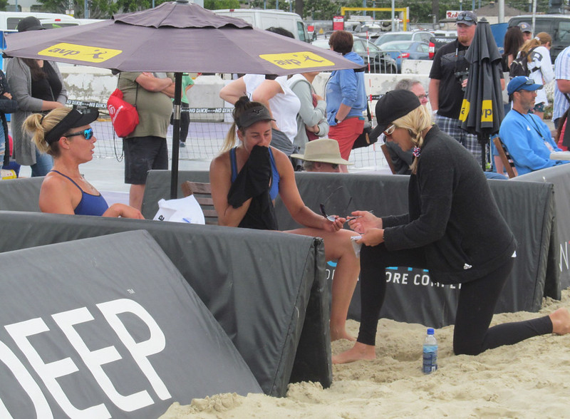 Beach volleyball professional now beach volleyball coach Jennifer Kessy coaches her former partner April Ross and Alix Klineman during a match. (Fossil Mike)