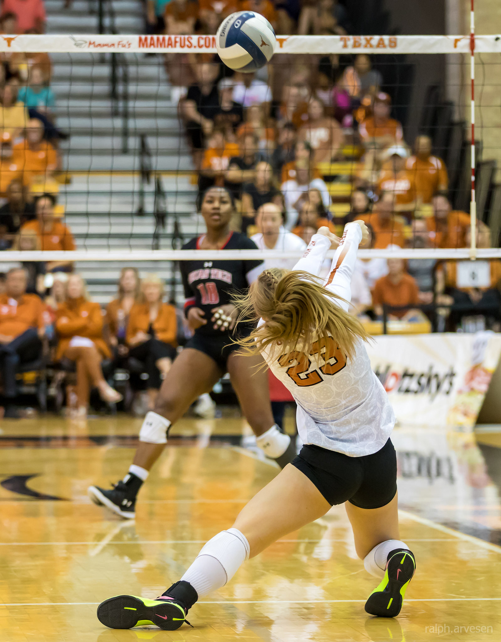 Fundamental skills of volleyball digging means to sink your hips low to the floor and you use your extended arms in your platform to "dig" or deflect the ball up in the air. (Ralph Aversen)