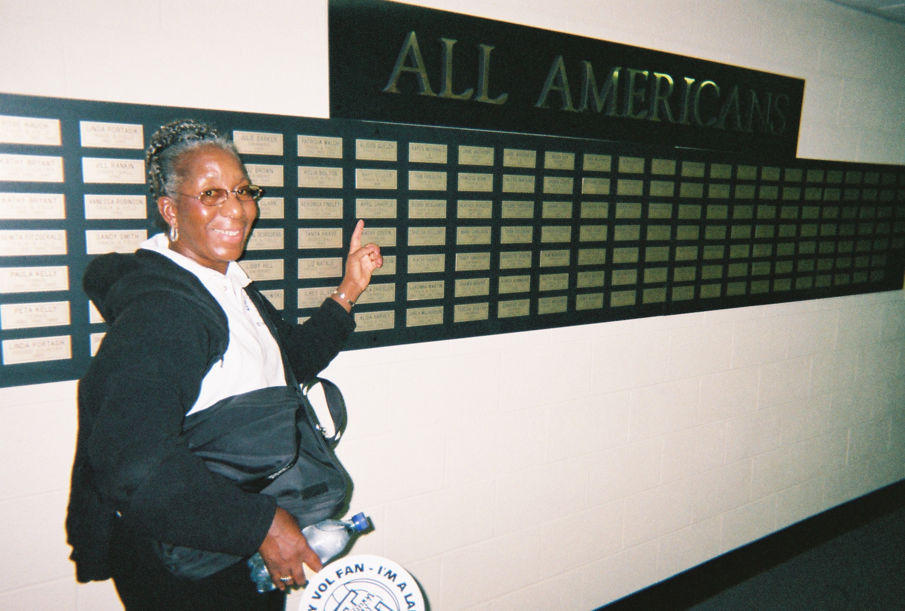My mom Sallye Yvonne Chapple (RIP) better known as "Galsal" proudly pointing to my All American plaque in the old Lady Vol department during my hall of Fame induction weekend.