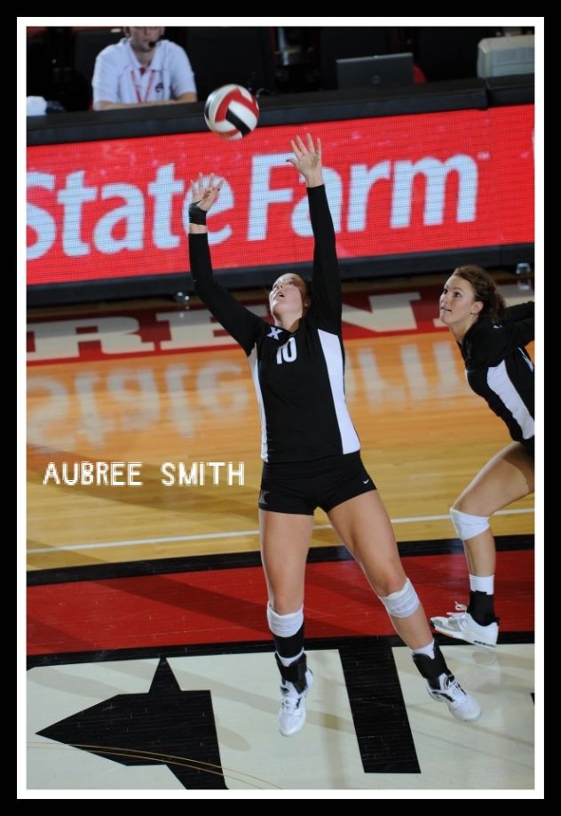 Players learn how to set a volleyball which begins with quick feet moving you to line your body under the ball and your ball shaped hands over your forehead.