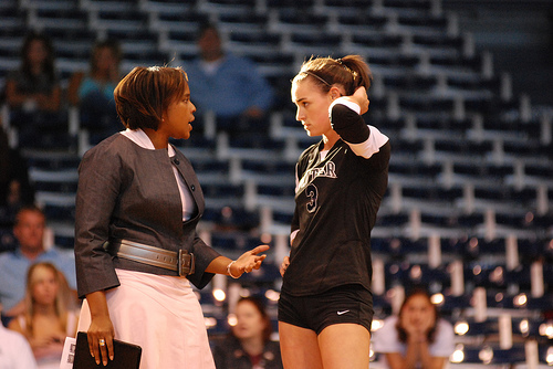 Good volleyball communication skills on the court during a game is crucial to your winning success. (Big East Butler coach talks to her setter)