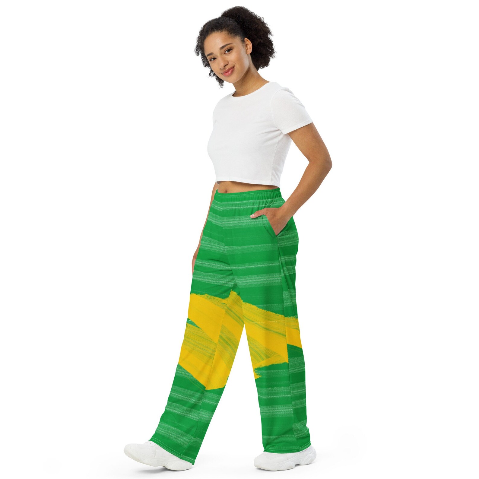 Now you know you want you some of these! Shop Brazilian flag inspired paint splatter and tie dye wide leg pants! This you?