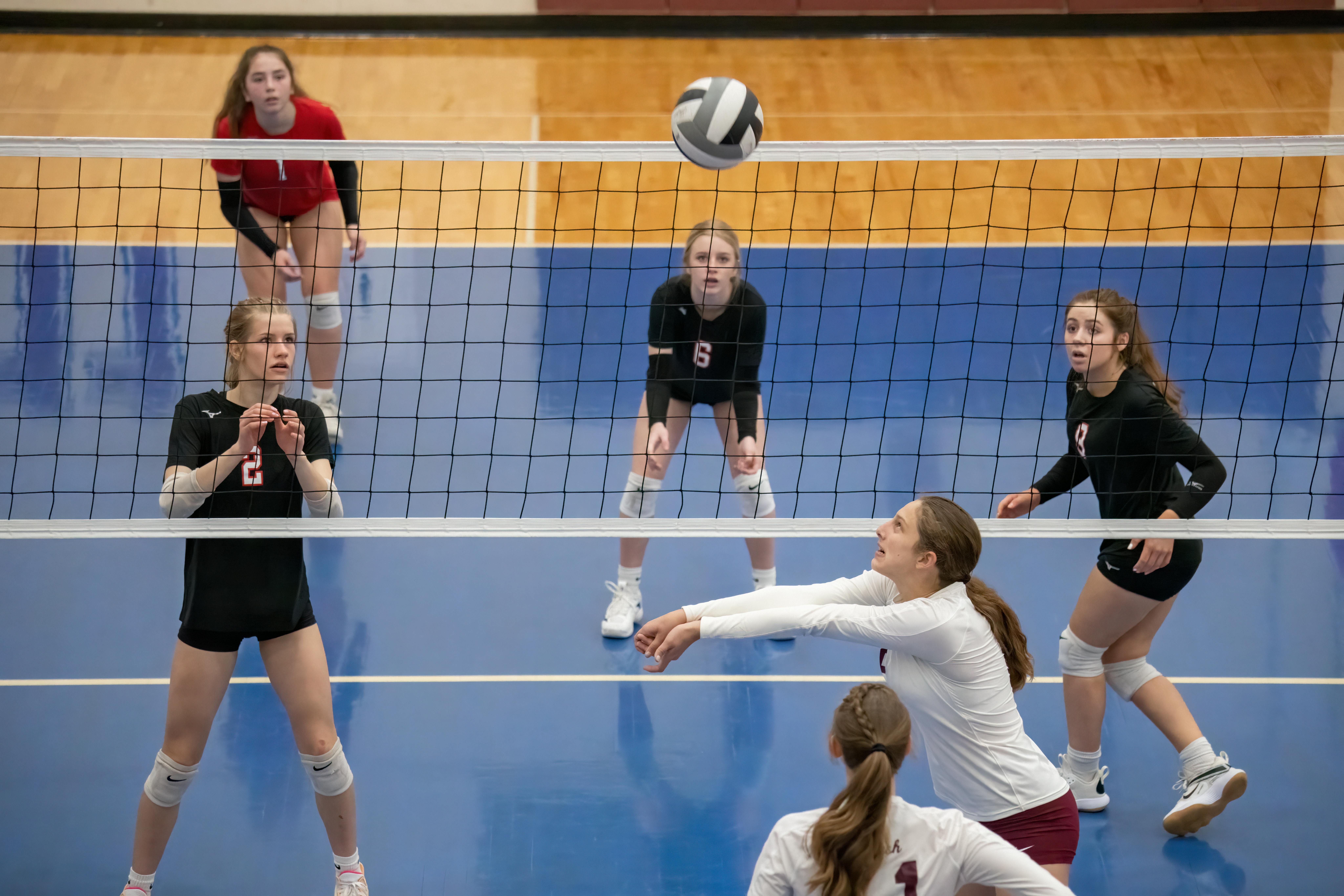 Learn about these five volleyball forearm pass tips that will help you get the ball to your setter consistently while your team is on serve receive in a rally. 