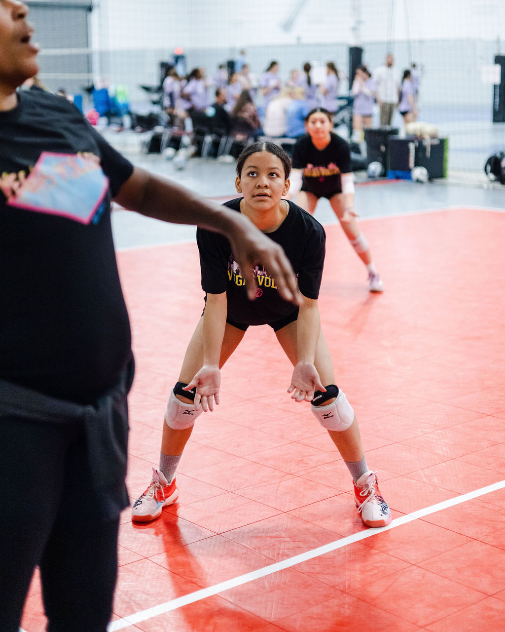 Diggers should be ready to reposition themselves according to the situation and the direction of the incoming ball - always staying low, ready, and maintaining a balanced and agile body posture.