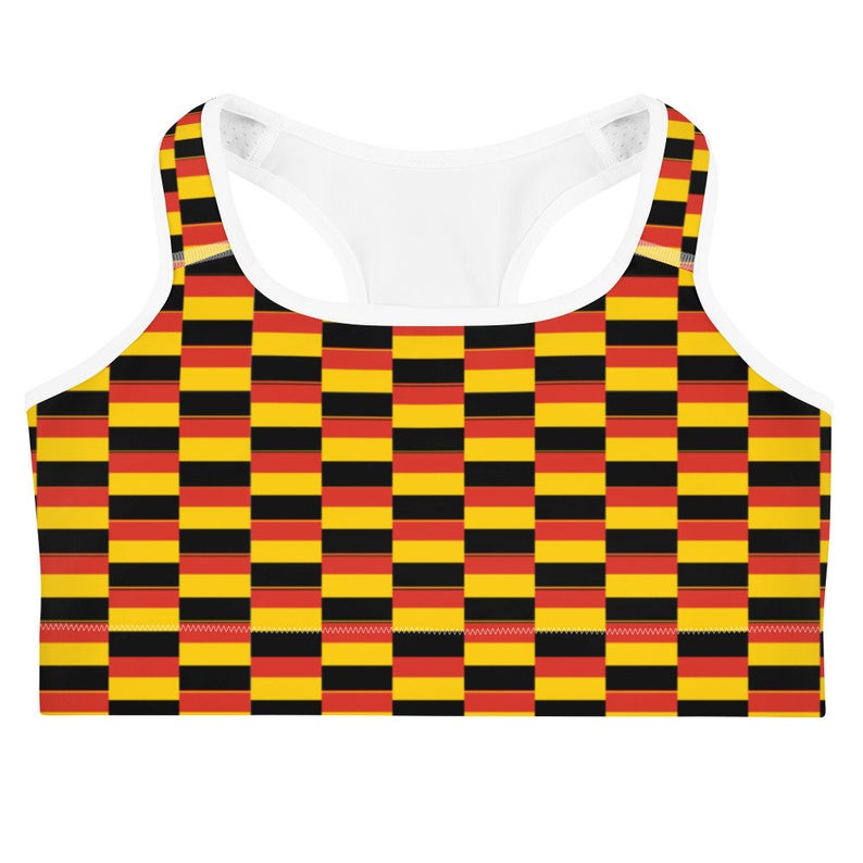 With the vibrant yellow and black shades of the national flag of Germany we integrated them into beautiful patterns on our loungewear, streetwear and volleyball outfits.