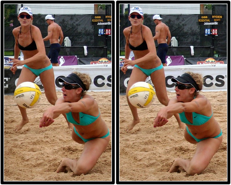 Beach volleyball professional Jennifer Kessy watches her partner April Ross pass during a match. (Fossil Mike)