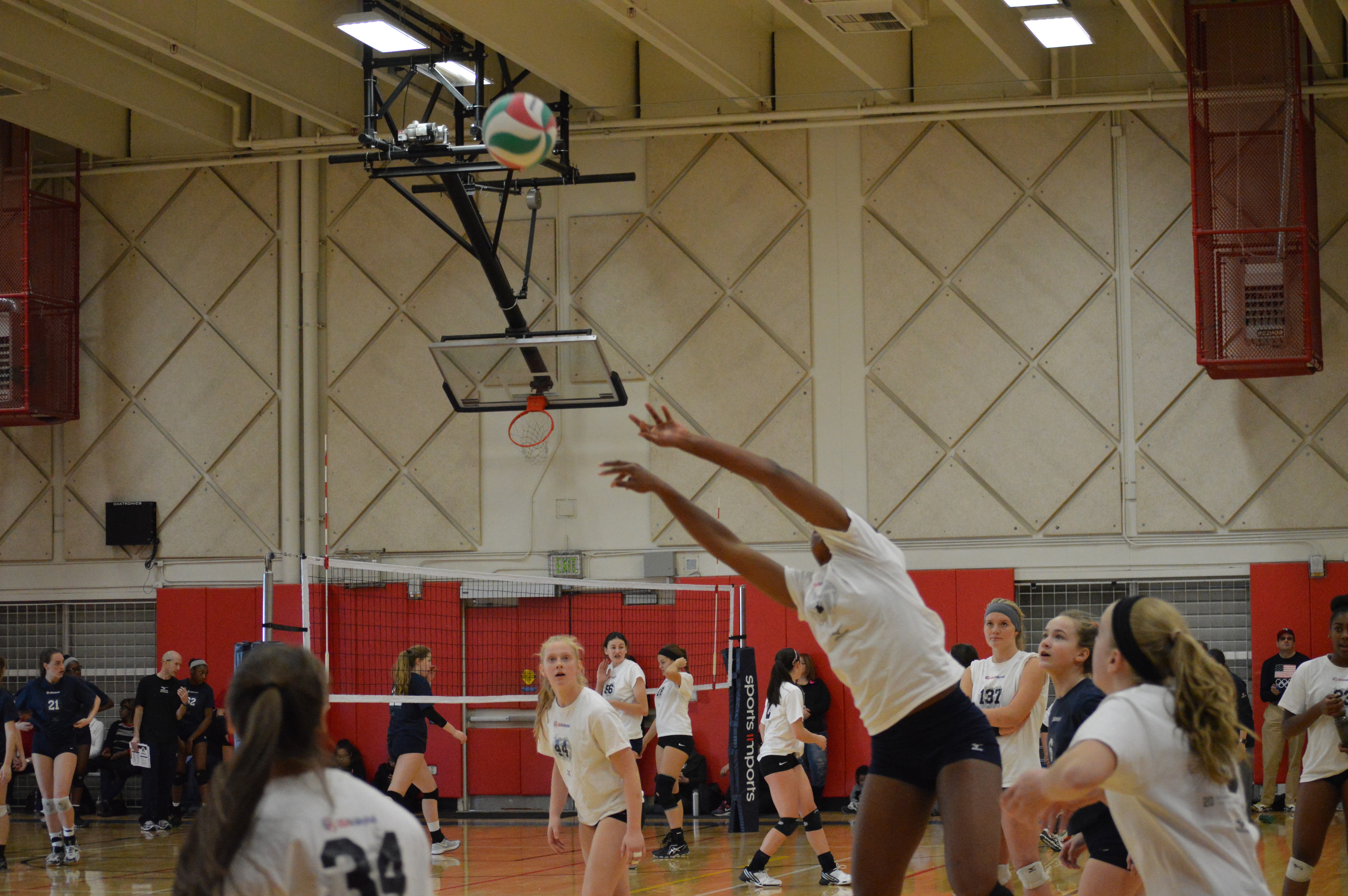 Tips For Short Volleyball Players: Kami Miner sets and out-of-system set from back row during the USA High Performance Holiday Camp during her last year in 8th grade.