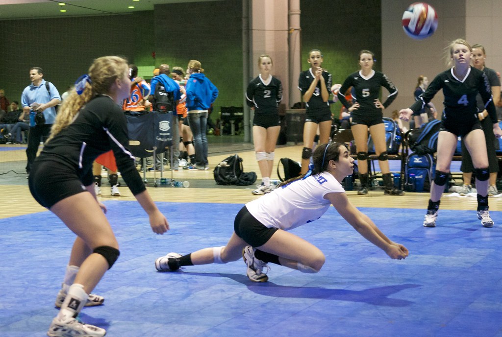 Court Volleyball Positions:   There are seven primary playing positions in volleyball, the setter, outside hitter, the opposite, the middle blocker, DS, libero and serving specialist. The volleyball defensive player known as the libero specializes in playing defense in any of the three zones in the back court. (Denis Wright)