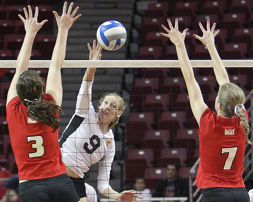 Three Volleyball Attack Tips Outside Hitters Use: Illinois State Redbirds volleyball hitter attacks against a double block. (Bill Shaner)