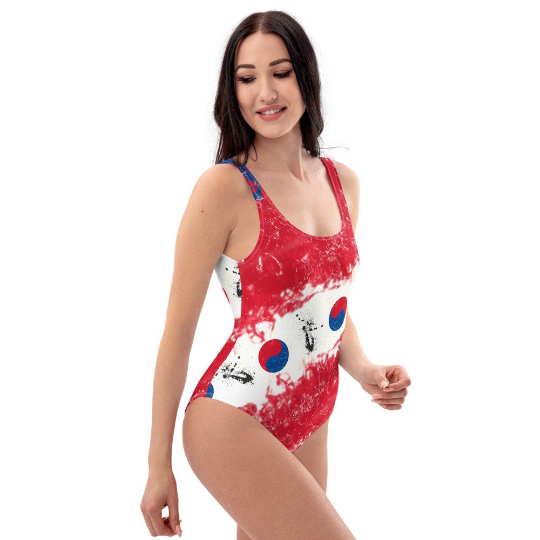 Some of the Volleybragswag tie dye one piece swomsuit designs feature the principal colors of a country's flag uniquely manipulated into a tie dye design to celebrate the Tokyo 2020 Olympics.