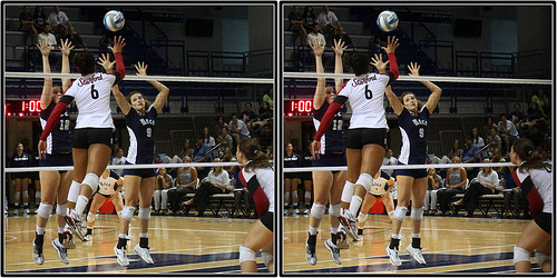 How To Block Volleyball Players: The hitter at the height of their jump will tip the ball softly over the double block in hopes that the ball lands in an open area of the court (Michael E. Johnston)
