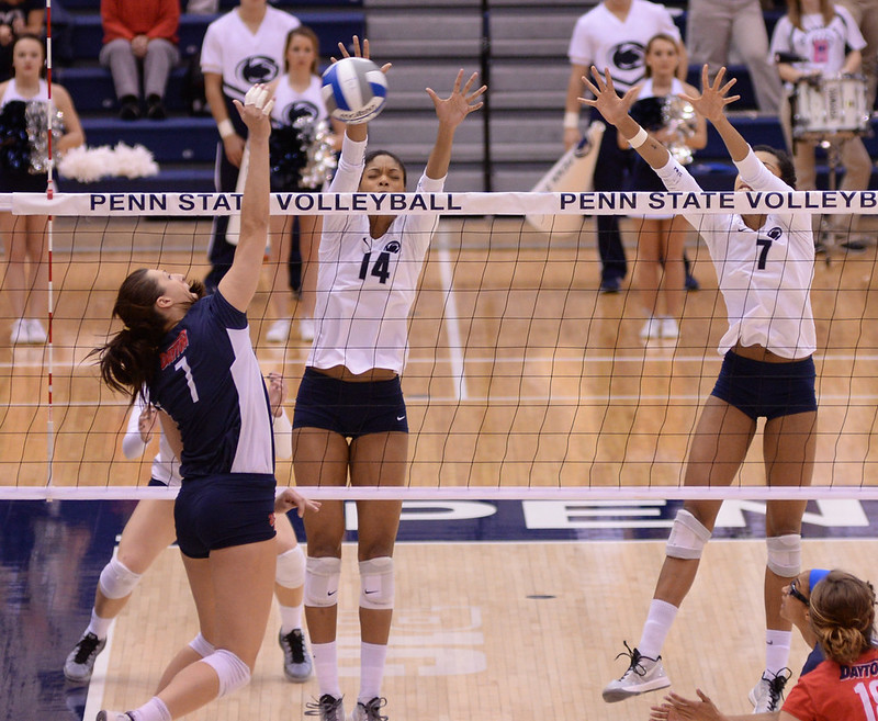 Learn blocking volleyball terms and definitions like how to "seal the net" and "read the hitter" two important blocking words for you to understand and know. (Penn State News photo)