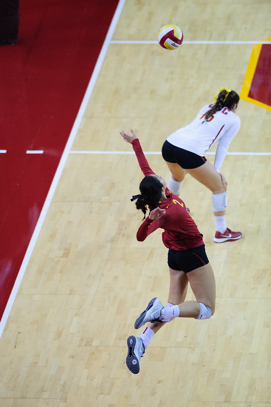 In this article I will teach you how to float serve, transforming your standing float or jump float serve into a consistent point scoring weapon so YOU become the tactical server known for analyzing the receiving team's passers during rallies in order to identify weak receivers or susceptible areas.
(photo usc jump server neon tommy)
