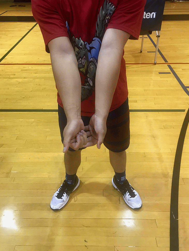 Volleyball Hands: To pass a volleyball with your platform point both thumbs down towards the ground, tightly holding your the wrists and thumbs of both hands together.