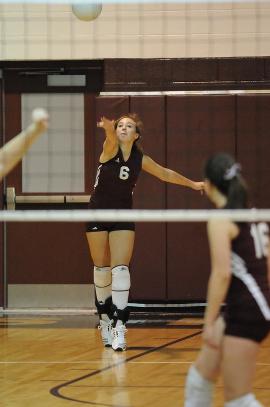 What's an overhand serve in volleyball?

There are a few different types of overhand serves in volleyball, but what they have in common is that you contact the ball after its been tossed in front of you with an "above the head" armswing so that it propels the ball over the net and into the the opposing team's court.

(Over the hand server photo Dan Morgan)