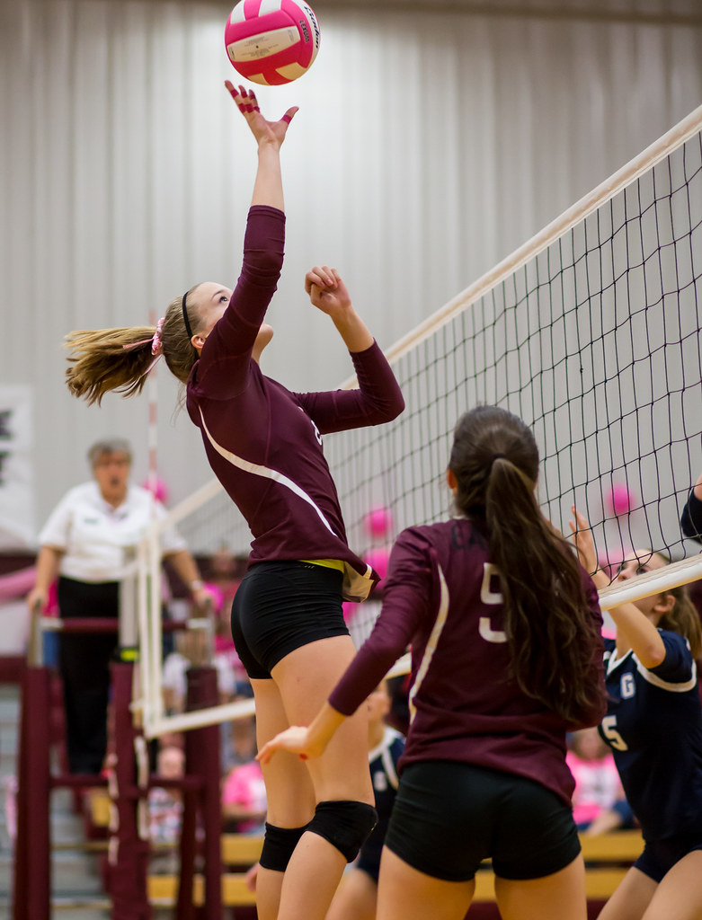 Offensive Volleyball Strategies on Tipping: A tip is the way to attack the ball using your fingertips to contact the ball to push it in the opposing team's court to score a point. (Ralph Arvesen)