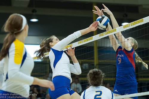 A successful Big 12 Kansas volleyball block. (ShakesKC)