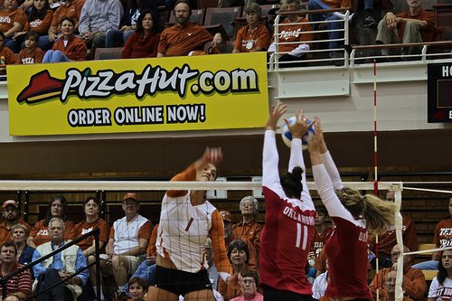 Blocking Tips Volleyball Players Know Blockers penetrate the plane of the net with angled hands/arms that deflect the ball to the middle of the opposing court. (Aaron Vazquez)