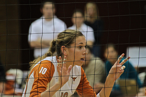 Blocker Volleyball Ready Position: Stay Squared to The Net - You want your hands to stay just above your shoulders, with your palms facing the net.