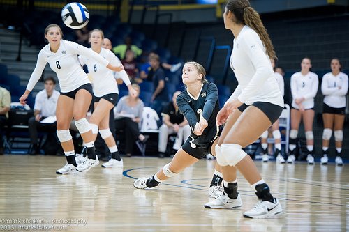 Volleyball bump: Whether its one side step or one lateral shuffle step away from you to your right or left side you want to beat the ball to THAT spot. (Mark Shaiken photo)