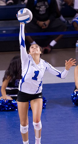 The overhand, underhand or jump volleyball serve is used to start a rally after the ref blows the whistle for the player in Zone 1 behind the service line.  