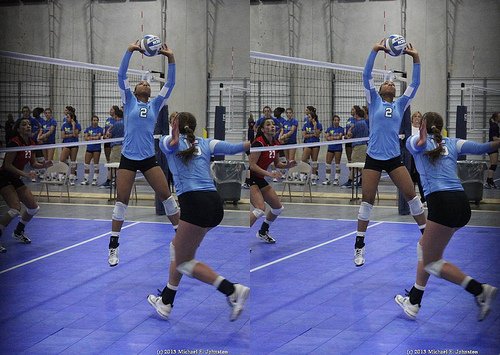 For the front set to the middle blocker your shoulders are right in front of your ears and when back setting your shoulders would be slightly behind your ears.  (photo by Michael E. Johnston)