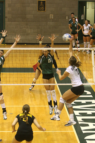 Volleyball Hits:  Cleveland State right side hitter attacks the ball cross court form Zone 2