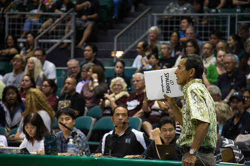 6 Positions of Volleyball: Hawaii Coach Dave Shoji communicates to his server what volleyball court zone he wants her to serve to. (Abercrombie)
