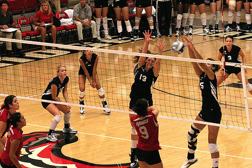 Volleyball Defensive Strategies: Front Row Blockers With Backrow Players In Defense Photo by Chris Daines