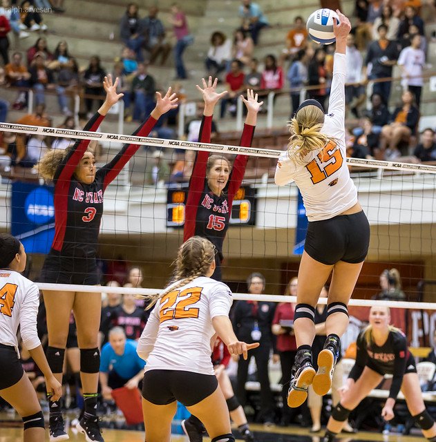 Terms For Volleyball Blocking Skills: After the serve, blockers at the net jump to deflect an attack hit to keep the ball from crossing the net. (Ralph Aversen)