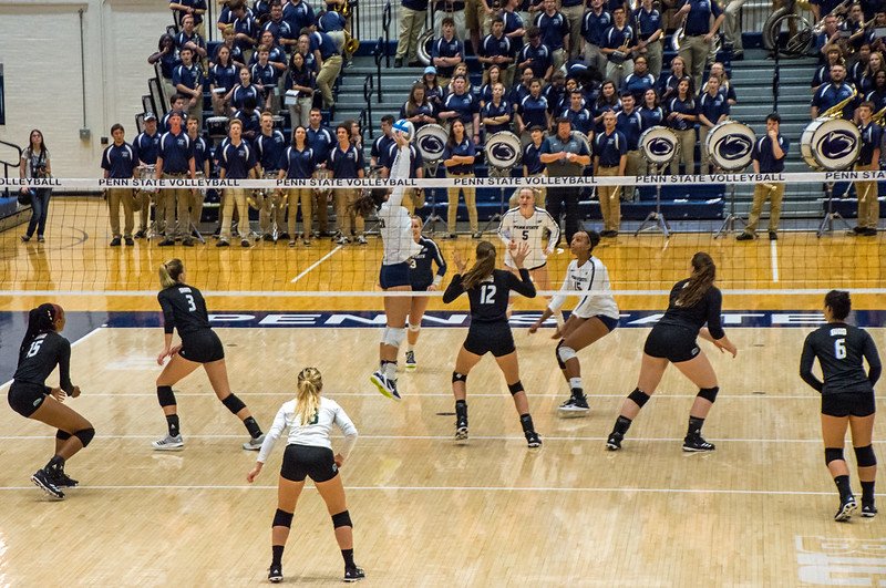 The rules of volleyball are 6 players per team, 3 in the front row and 3 in the backrow. A rally begins with a referee whistle blow and 3 contacts per side. 