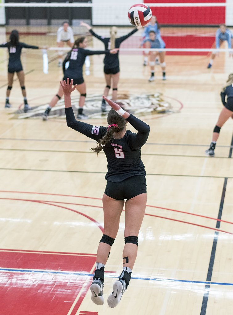 Volleyball digging: Serving is separate from the act of running to your defensive position. Make a tough or strategic serve, then run into the court to get to your base position in defense (Al Case)