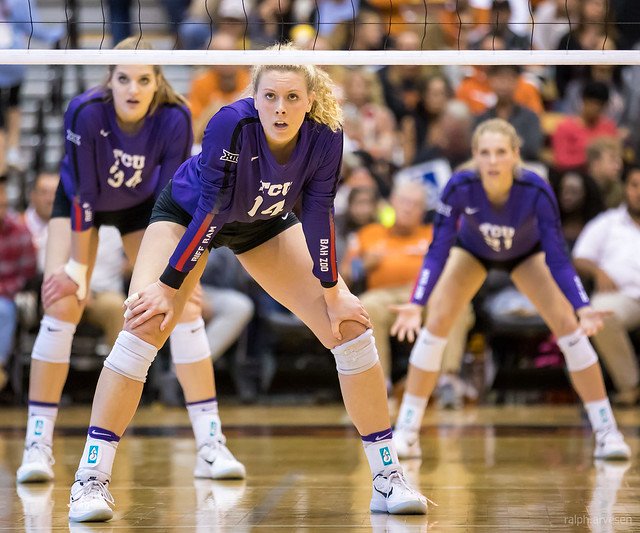 Before the serve keep feet shoulder width apart in a balanced position with knees bent and right foot 2 inches in front of your left. Hands on knees with shoulders over the knees. (Aversen)