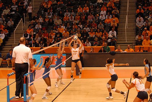 The setter volleyball player runs the offense by telling her hitters what plays they will run after the opposing team serves the ball. (photo Tennessee Journalist)