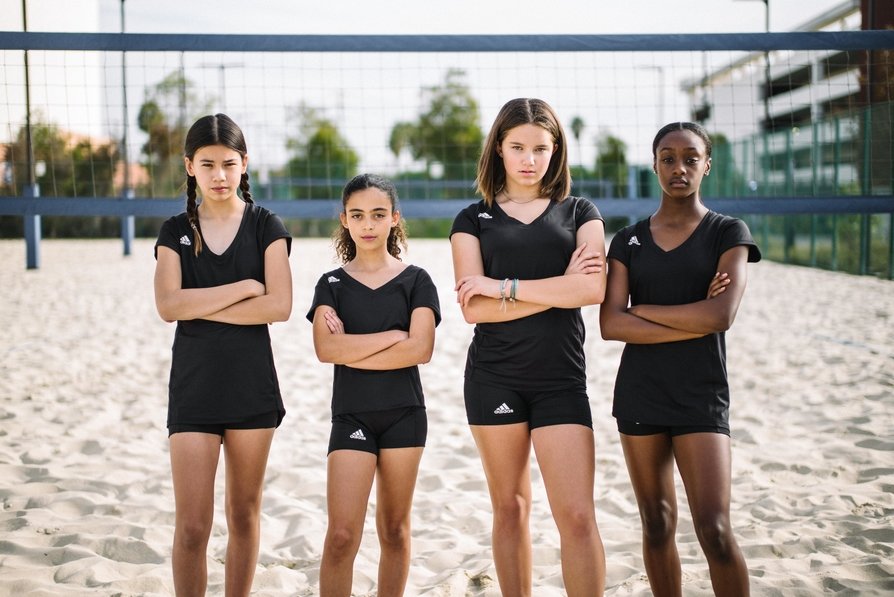The volleyball uniforms players wear consist of a jersey, shorts sweatpants and sweat jacket and on their lower body they wear include shoes, socks, kneepads