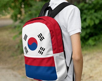 Are backpacks in? Yes they are and I've got cute back to school backpacks inspired by the Tokyo Olympics world flags of countries in the volleyball tournament