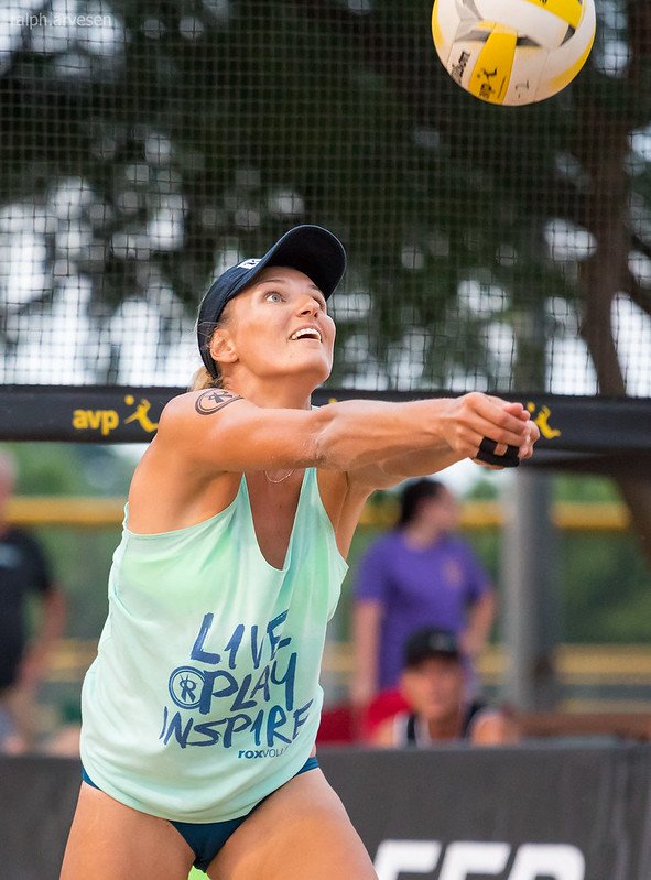 Using the bump set volleyball skill instead of hand setting to your partner to hit it is a good option on an uneven surface and windy weather. (Ralph Aversen)