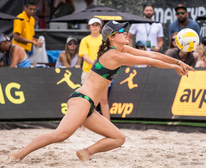 Learn several ways you can take advantage of the benefits of playing beach volleyball in order to help improve your indoor volleyball playing skills.  (Ralph Aversen)