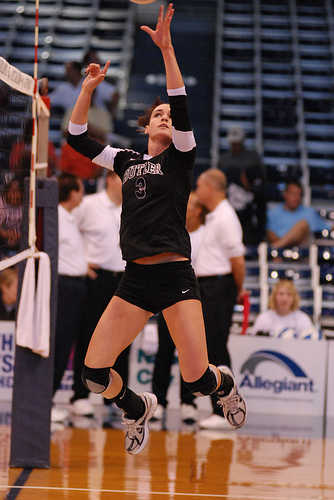 The dump set is a deceptive move executed by the setter when in they're in the front row. Instead of setting the ball to a hitter, the setter decides to tip or softly push the ball over the net, catching the opposing team off-guard.