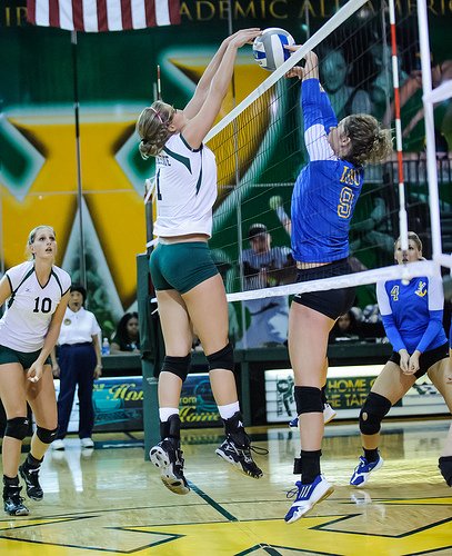 Tips on Volleyball: A joust is when both a blocker and a hitter contact the ball when its above the net, at the same time.   (CE Andersen photo)