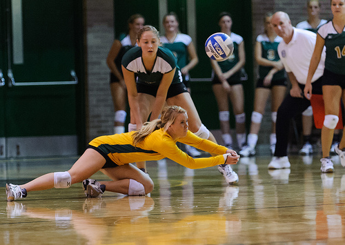 Court Volleyball Positions: The volleyball defensive player known as the libero specializes in playing defense in any of the three zones in the back court. (CE Andersen)