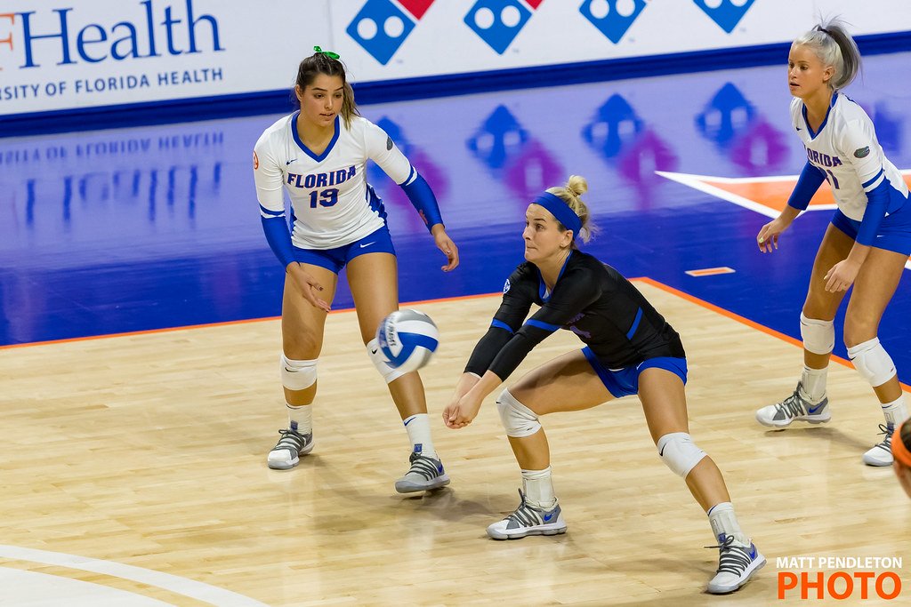 One of the Best Volleyball Tips For Passing on Improve your Volley. Run with your arms apart to get into position to pass the ball.