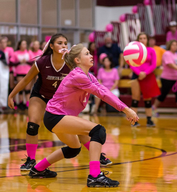 There are three volleyball forearm pass cues you should use to improve your passing skills, keep your arms together, both feet on the ground, position yourself behind the ball.