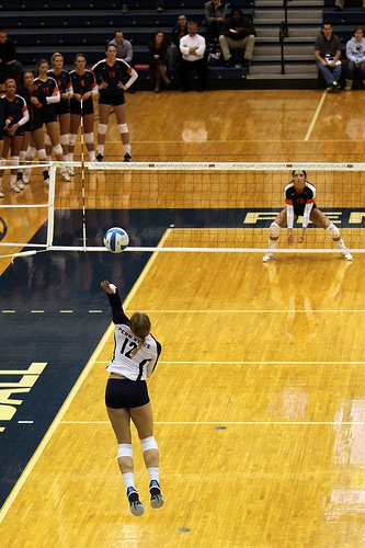 For better volleyball passing if a server steps up really close to the service line then you should tell your teammates in a loud voice "Watch out for the short serve!"